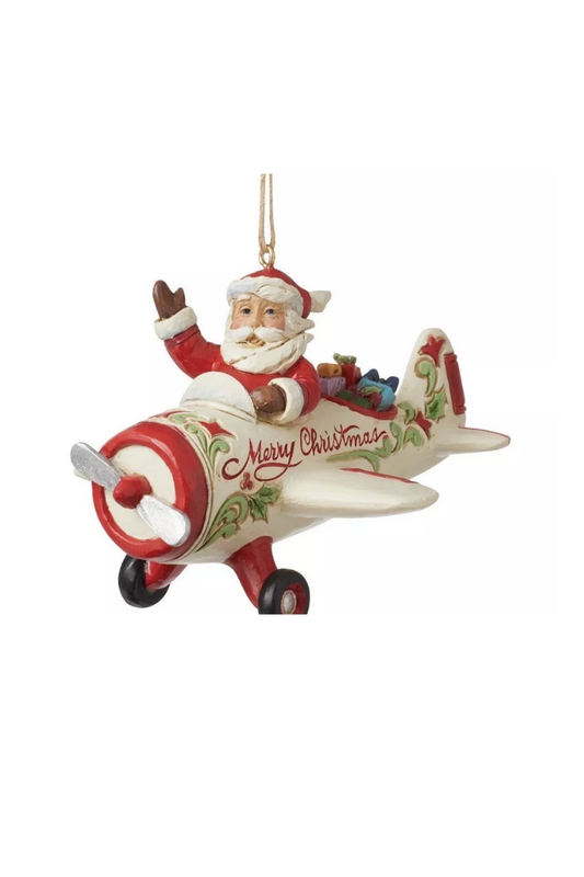 Gray Jim Shore Santa in Airplane Ornament
